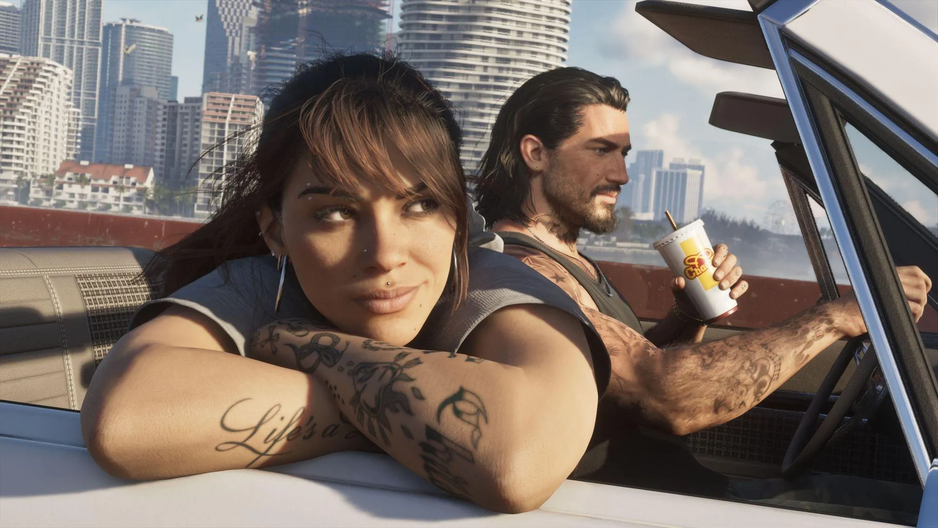 Lucia leaning on a convertible with Jason behind her